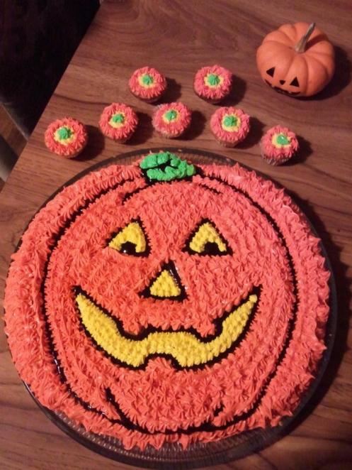 Pumpkin Cake with matching baby cupcakes.